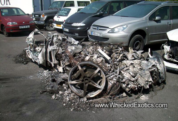 a-moment-of-silence-ferrari-458-italia-utterly-destroyed-by-fire-image-via-wrecked-exotics_100316638_m.jpg