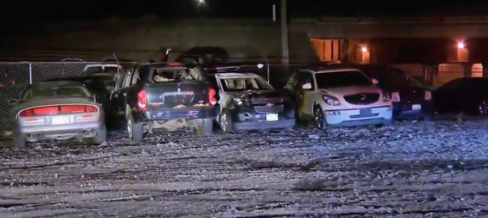 cars damaged in car dealership in Chicago